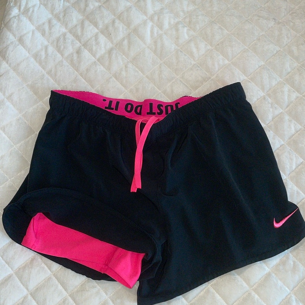 Nike size Medium Black shorts with hot pink built in bike shorts